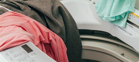 Clothes thrown around on washing machine